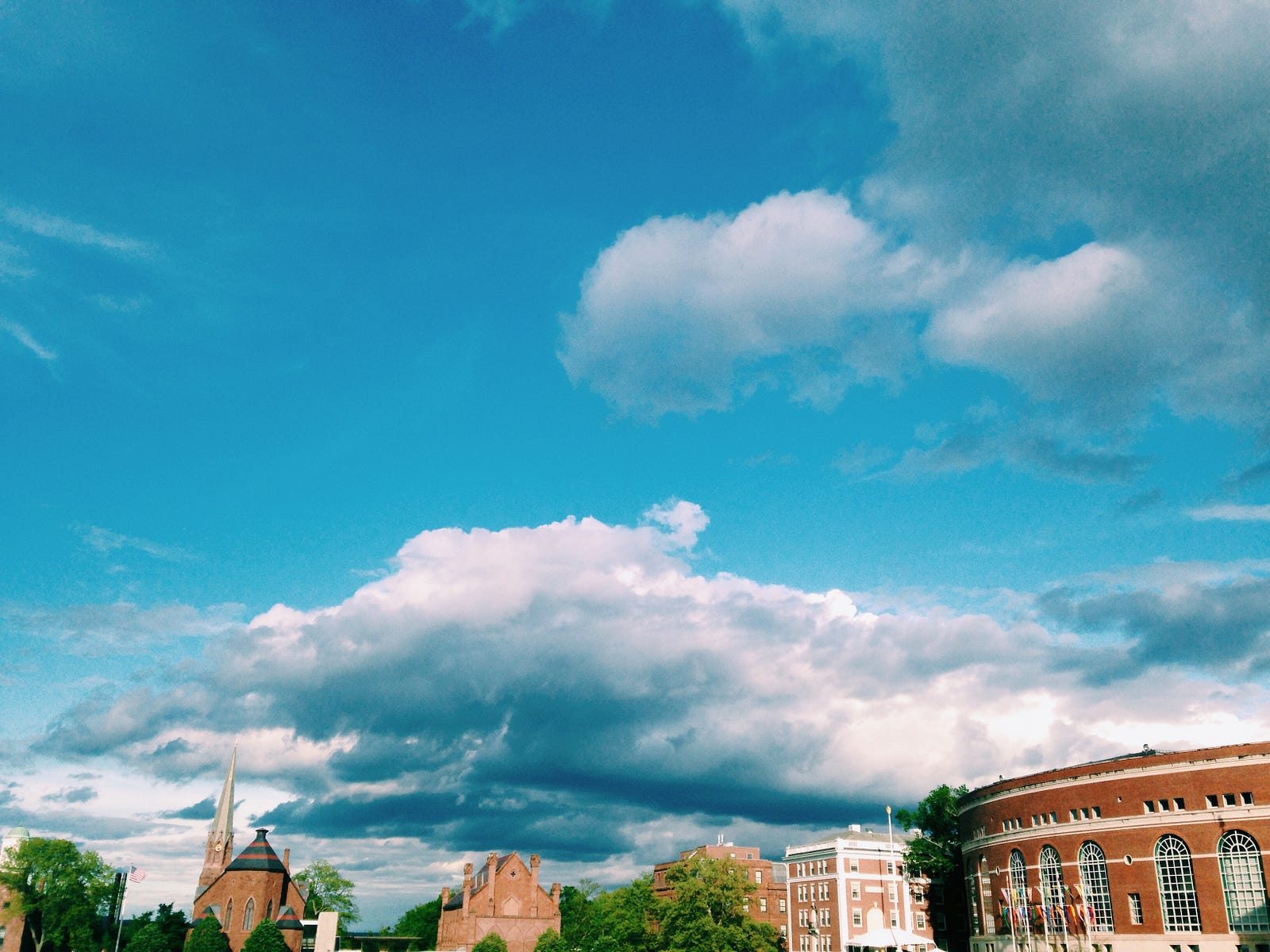 Blue sky over brick buildings
